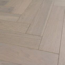 Liberty Floors Pebble Grey Oak - Herringbone Parquet 14mm Engineered Real Wood Flooring (219386) -Flooring Materials pebble grey oak herringbone parquet 14mm engineered real wood flooring 219386 p85834 201394 image