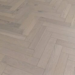 Liberty Floors Pebble Grey Oak - Herringbone Parquet 14mm Engineered Real Wood Flooring (219386) -Flooring Materials pebble grey oak herringbone parquet 14mm engineered real wood flooring 219386 p85834 201395 image