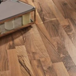 Kronotex Ticino Walnut - Superior 6mm Laminate Flooring (219527) -Flooring Materials ticino walnut superior 6mm laminate flooring 219527 p85898 196513 image